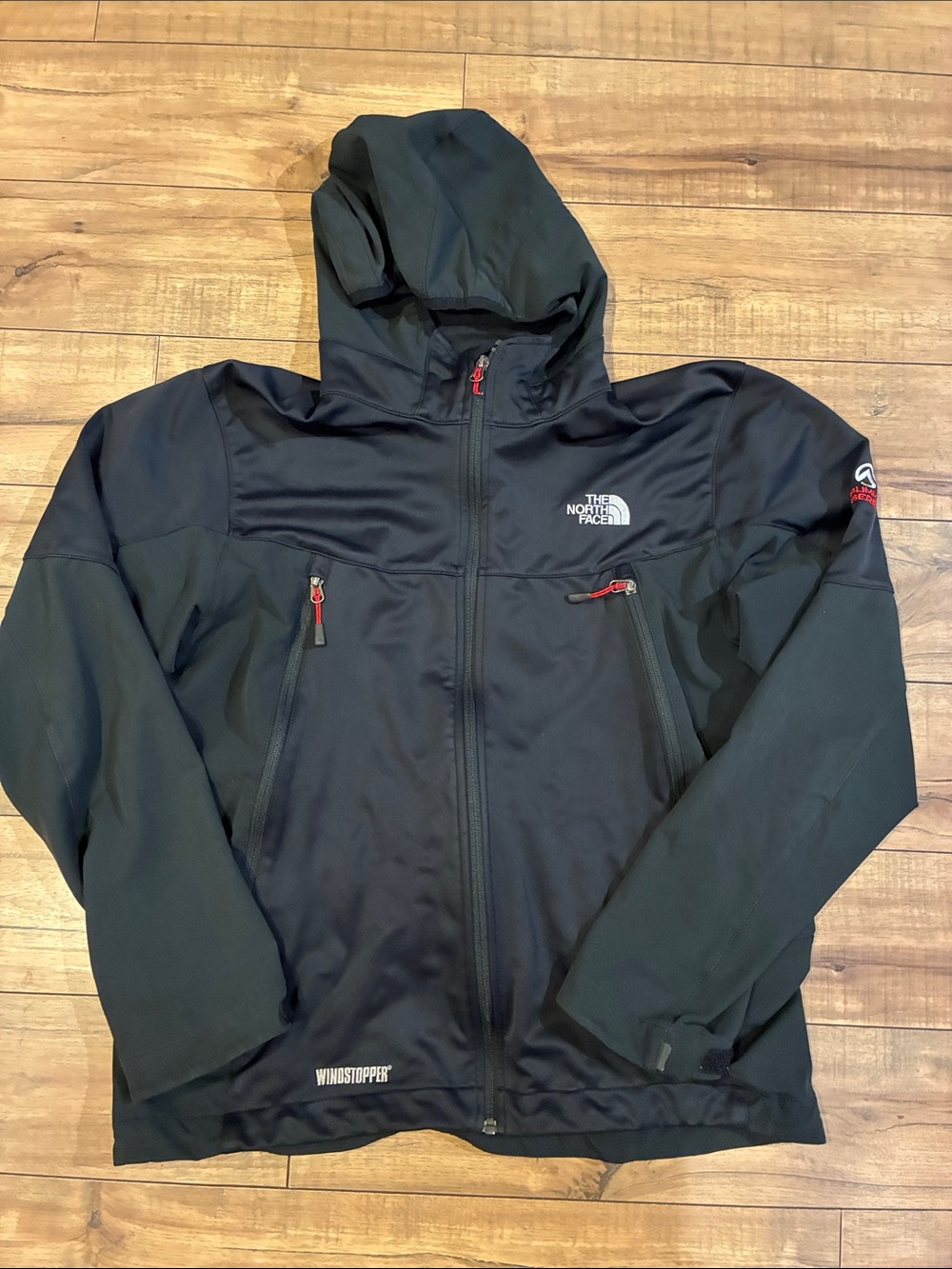 The North Face Black Hooded Windbreaker Windstopper with Red Zipper Accents